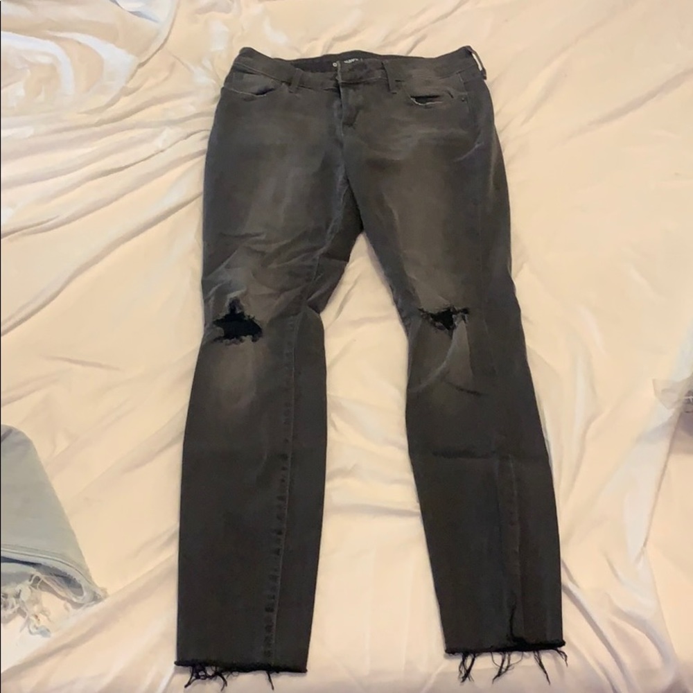 Dark gray/ black old navy distressed jeans.